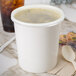 Choice 32 oz. White Double Poly-Coated Paper Food Cup with Vented ...