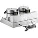 A white Carnival King double waffle maker with two round metal cylinders.