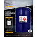 A blue barrel with a white Avery UltraDuty GHS chemical label on it.