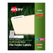 A package of 100 sheets of Avery white file folder labels with a green and white Avery label on top.