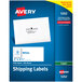 A blue box of white Avery shipping labels with a white background.