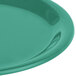 A close-up of a Carlisle meadow green melamine pie plate with a narrow round rim.