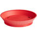 A red round plastic container with a base and holes in the bottom.
