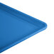 A close-up of a blue Cambro dietary tray with a blue and white corner.