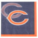 A Creative Converting Chicago Bears beverage napkin with a Chicago Bears logo and a letter C.
