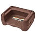 A brown plastic Koala Kare booster seat with a safety strap.