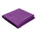 A folded purple Intedge cloth table cover.