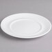 A Villeroy & Boch white porcelain plate with a circular edge.