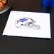A blue Creative Converting napkin with a drawing of a Buffalo Bills football helmet on it.