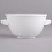 A white porcelain Villeroy & Boch soup bowl with two handles.