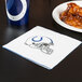 A Creative Converting Indianapolis Colts luncheon napkin with the team logo on it next to a plate of food.