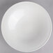 A Villeroy & Boch white porcelain deep plate on a gray background.