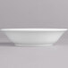 A white Villeroy & Boch Corpo porcelain bowl on a gray surface.