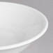 A close-up of a Villeroy & Boch white porcelain bowl with a rim.