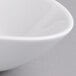 A close-up of a Villeroy & Boch white porcelain oval deep bowl.