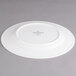 A white Villeroy & Boch porcelain flat plate with a white rim.