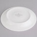 A white Villeroy & Boch porcelain saucer with a white rim.