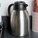 Choice 64 oz. 9 1/2" x 5 1/2" Insulated Thermal Coffee Carafe / Server Black Brew Thru Lid Main Thumbnail 7