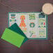 A table set with green and orange St. Patrick's Day placemats.