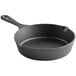 A black Choice 8" cast iron skillet with a handle.