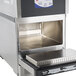 A Merrychef eikon e2s Classic countertop rapid cook oven with the lid open.