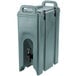 A slate blue plastic Cambro Camtainer insulated beverage dispenser with a lid and a tap.