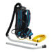 A Lavex backpack vacuum with a hose attached.