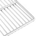 A stainless steel Cooking Performance Group Salamander oven rack with a handle.