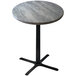 A round table with a grey stone top and metal base.