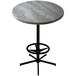A round grey stone Holland Bar Table with a metal base.