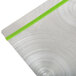 A Menu Solutions Alumitique aluminum menu board with green bands on a table.
