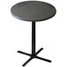 A round charcoal Holland Bar Stool counter height table with a black metal base.