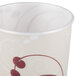 A Solo Symphony foam cup with a red and white swirl design.