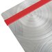 A close-up of a Menu Solutions Alumitique aluminum menu board with red bands.