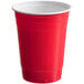 A red plastic cup with a white rim.