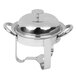 A silver stainless steel Libbey chafing dish with a lid.