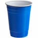 A blue plastic cup with a white rim.
