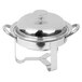 A Libbey stainless steel chafing dish with a lid.