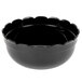 A black Cal-Mil fluted bowl with scalloped edges.