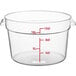 A clear plastic Choice round food storage container with measurements on the side.