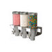 A white wall-mounted Rosseto triple dispenser with candy and sprinkles inside.