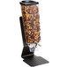A black steel Rosseto cereal dispenser filled with nuts and seeds.