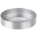 A round silver stainless steel dispenser lid with a white label.