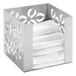 A stainless steel Rosseto napkin holder with white folded napkins in it.