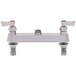 A silver Fisher deck mount faucet base with two control valves and lever handles.