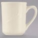 A Libbey cream white china mug with a handle.