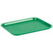 A green plastic Choice fast food tray on a counter.