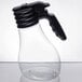 A clear plastic Tablecraft dispenser bottle with a black plastic top.