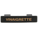 A black rectangular Tablecraft dispenser tag with orange "Vinaigrette" text.