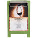 A Menu Solutions lime wood menu board tent with clip on a table with a glass of red wine.